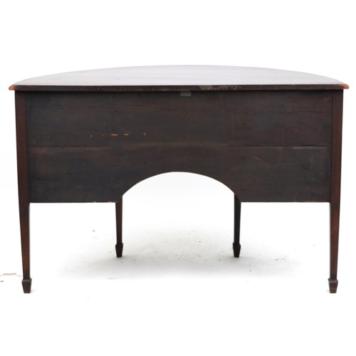 2039 - A Victorian mahogany demi lune sideboard fitted with a single frieze drawer flanked by cupboards, ra... 