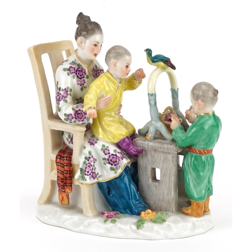 118 - A mid 20th century Meissen porcelain chinoiserie decorated figure group of a mother and two children... 