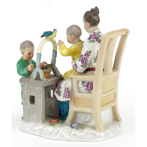 118 - A mid 20th century Meissen porcelain chinoiserie decorated figure group of a mother and two children... 