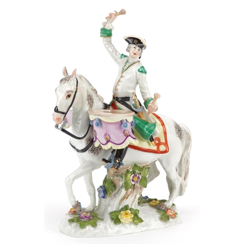 117 - A mid 20th century Meissen porcelain figure group of a military drummer on horseback, underglaze blu... 