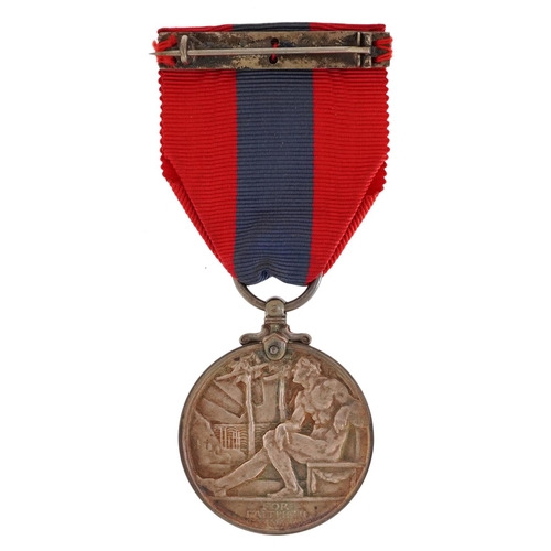 2494 - A George V Faithful Service medal with box awarded to Henry George Tenwick.