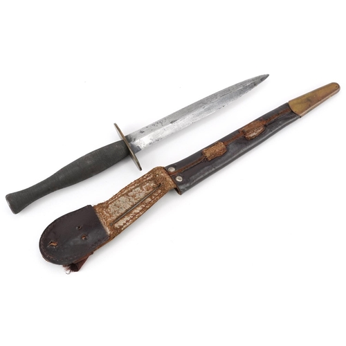 2522 - A British military Fairbairn Sykes style Commando dagger with leather sheath, 32cm in length.