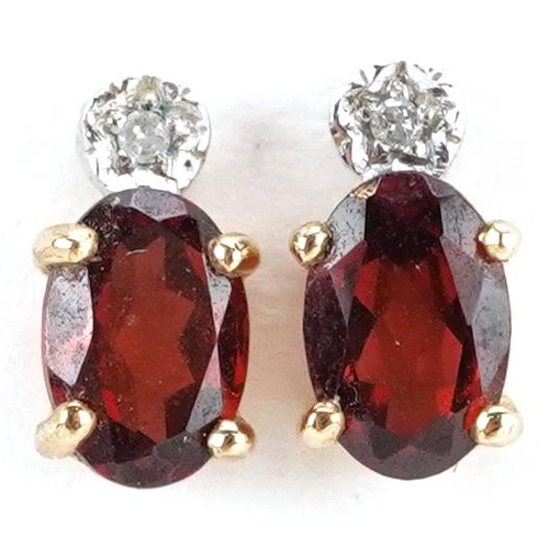 3496 - A pair of 9ct gold garnet and diamond stud earrings, 8.5mm high total 1.1g.