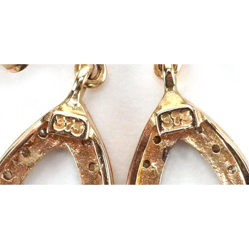 3066 - A pair of 9ct gold diamond drop earrings, 2.5cm high, total 1.9g.