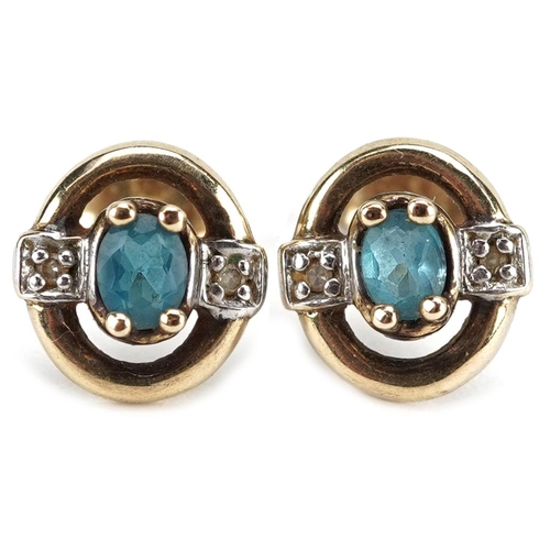 3158 - A pair of unmarked gold blue spinel and diamond stud earrings, 9.3mm high, total 1.7g.