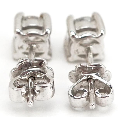 3089 - A pair of 14ct white gold diamond stud earrings, 4.20mm in diameter, total 1.7g.