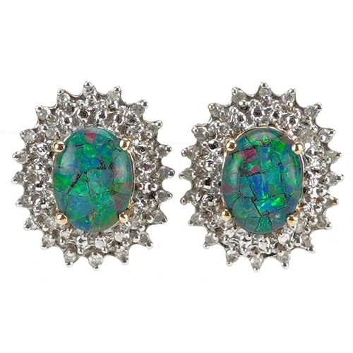 3166 - A pair of 9ct gold opal and diamond cluster stud earrings, 14.4mm high, total 2.9g.