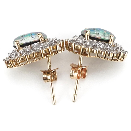 3166 - A pair of 9ct gold opal and diamond cluster stud earrings, 14.4mm high, total 2.9g.