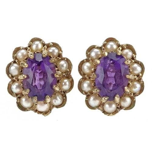 3219 - A pair of 9ct gold amethyst and seed pearl stud earrings, 11.5mm high, total 2.2g.