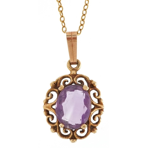 3033 - A 9ct gold amethyst pendant on a 9ct gold necklace, 17.7mm high and 44cm in length, total 2.1g.