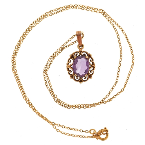 3033 - A 9ct gold amethyst pendant on a 9ct gold necklace, 17.7mm high and 44cm in length, total 2.1g.