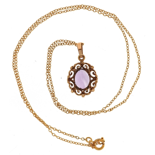 3033 - A 9ct gold amethyst pendant on a 9ct gold necklace, 17.7mm high and 44cm in length, total 2.1g.