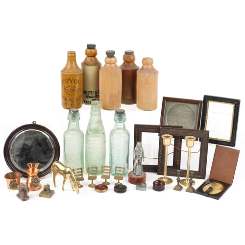 1234 - A mixed group of collector's items including stoneware bottles, glass jars, small circular mirror, p... 