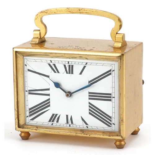 93 - A French Art Deco gilt brass carriage clock, the white enamelled dial with Roman numerals, presented... 