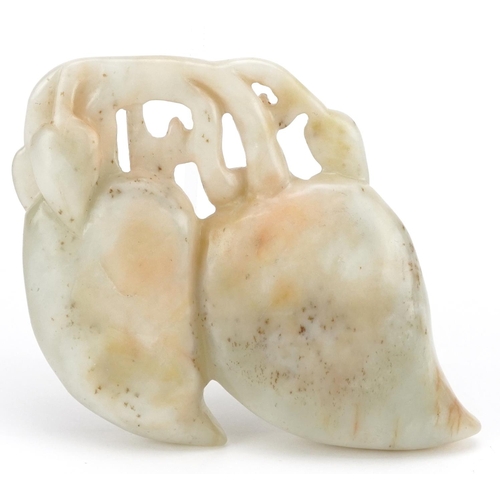 396 - A Chinese celadon jade brush washer, late 19th century, in the form of town leafs, 9cm wide.