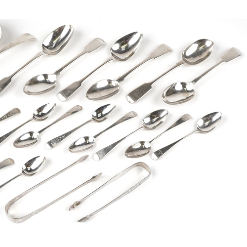  A collection of Georgian and later silver flatware including two pairs of sugar tongs, two ladles an... 