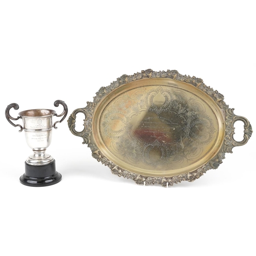 587 - A George V silver twin handled trophy engraved A Replica of the Caffinite House Cup presented to E A... 