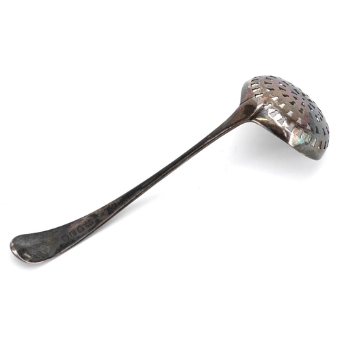 586 - A George III silver sifting spoon, indistinct maker's mark, London 1815, 15cm in length, 30.7g.