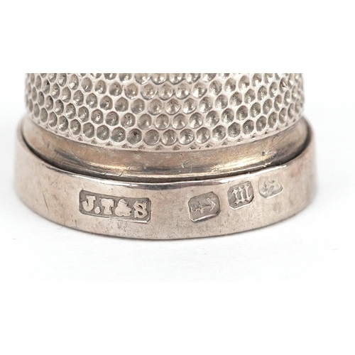 130 - A white metal wicker design thimble case housing a Victorian silver thimble dated 1896, the case 2.8... 