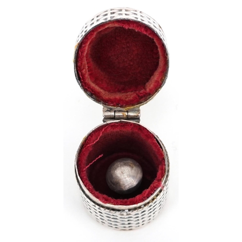 130 - A white metal wicker design thimble case housing a Victorian silver thimble dated 1896, the case 2.8... 