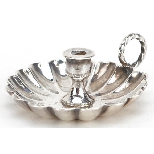 225 - William Comyns, a miniature Victorian silver chamberstick, incomplete hallmarks, 4.5cm in length, 11... 