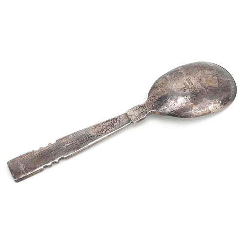 585 - Arthur C Kemp, an Arts & Crafts style silver spoon with planished bowl, Birmingham 1943, 15cm in len... 