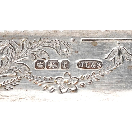 575 - James Lewis & Sons, an Edwardian silver bread knife with mother of pearl handle, Sheffield 1909, 22.... 