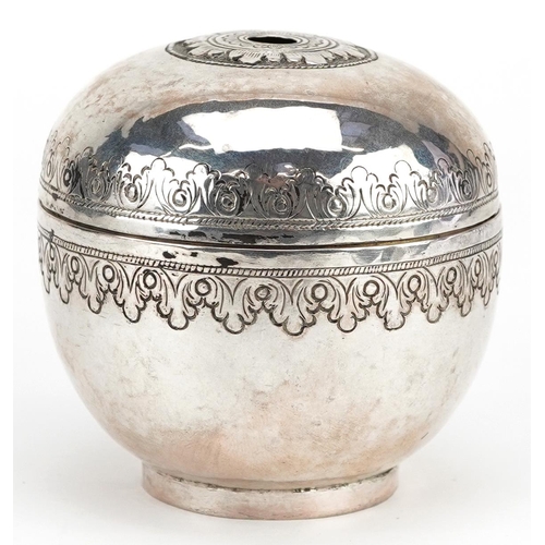 555 - A 19th century unmarked silver string box with gilt interior and engraved decoration, probably Persi... 