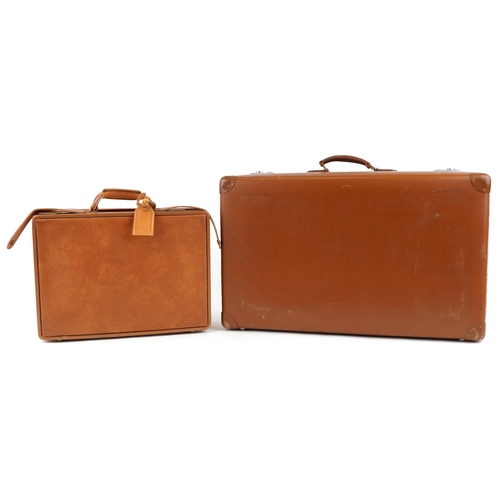 1026 - A vintage Hartmann Luggage brown leather suitcase, 46cm wide, together with a mid 20th century brown... 