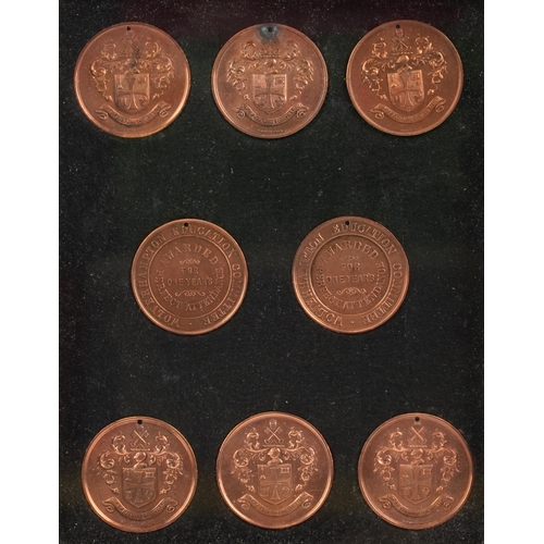 2255 - A set of eight early to mid 20th century Wolverhampton Education Committee bronze One Year Perfect A... 