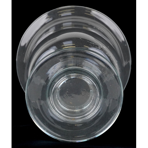 1171 - A 20th century clear glass hurricane lamp on a footed base, H-30cm