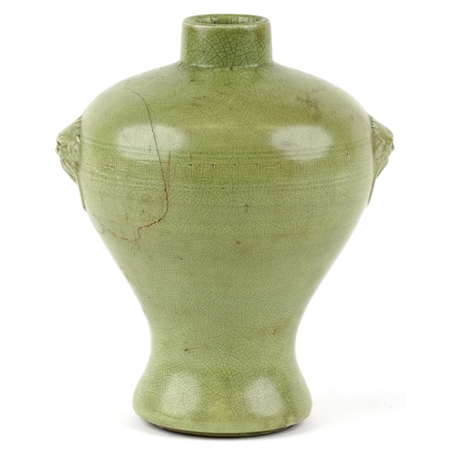 205 - A Chinese celadon green Mei Ping Vase, 20th century, the shoulders modelled with ring masks, Greek f... 