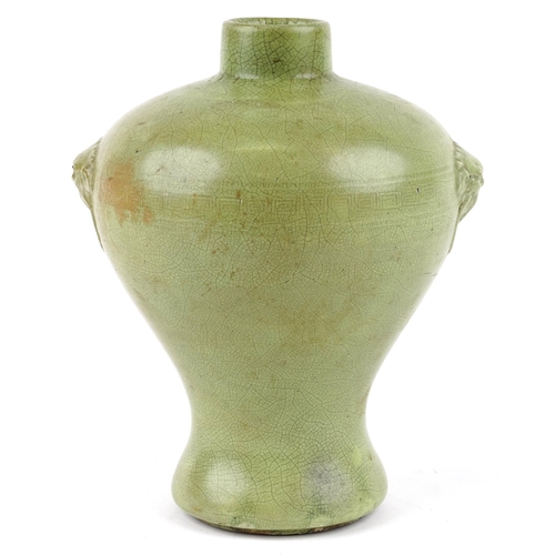 205 - A Chinese celadon green Mei Ping Vase, 20th century, the shoulders modelled with ring masks, Greek f... 