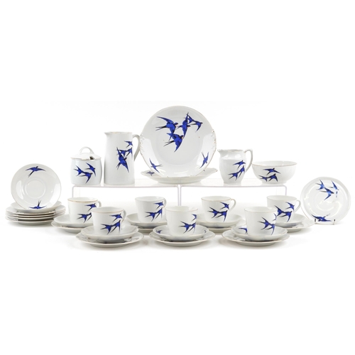 495 - A 20th century Czechoslovakian part tea service comprising cups, saucers, milk jug, sugar bowl and s... 