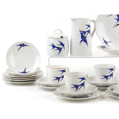 495 - A 20th century Czechoslovakian part tea service comprising cups, saucers, milk jug, sugar bowl and s... 