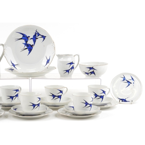 495 - A 20th century Czechoslovakian part tea service comprising cups, saucers, milk jug, sugar bowl and s... 