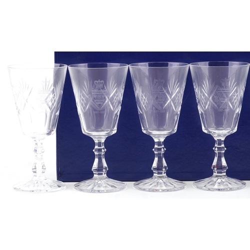 489 - A set of six Royal Eastbourne Golf Club cut glass wine glasses dated 1887-1987, cased.