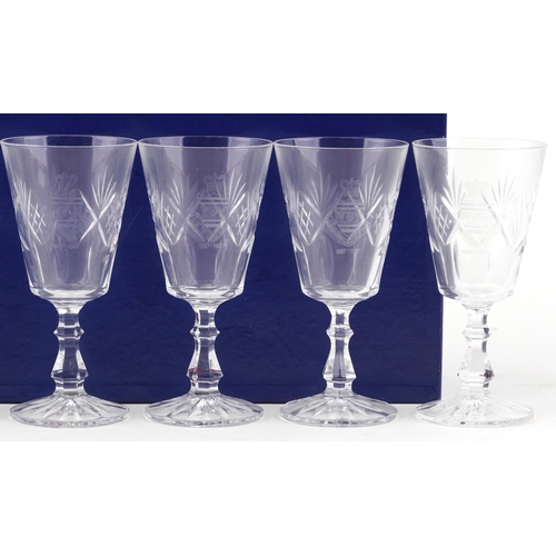 489 - A set of six Royal Eastbourne Golf Club cut glass wine glasses dated 1887-1987, cased.