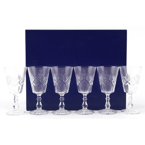 489 - A set of six Royal Eastbourne Golf Club cut glass wine glasses dated 1887-1987, cased.