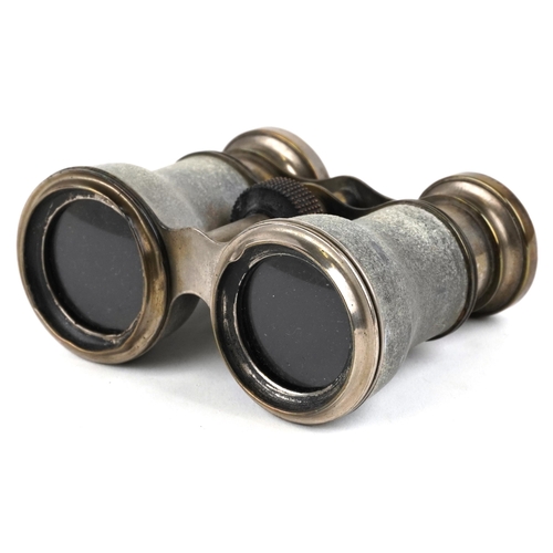 1005 - A pair of early 20th century French Le Jockey Club binoculars, Paris, 11cm wide.