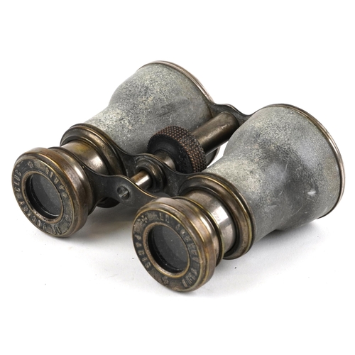 1005 - A pair of early 20th century French Le Jockey Club binoculars, Paris, 11cm wide.