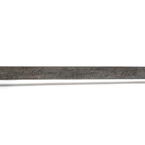 2528 - A French military rifle bayonet with scabbard with 1876 inscription to the spine of the blade, 66cm ... 