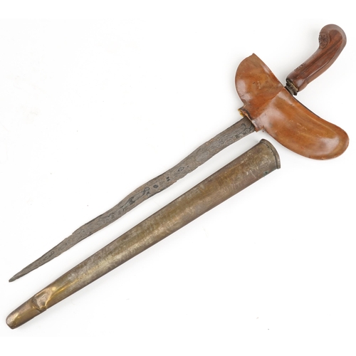 2532 - A vintage Indonesian kris knife with scabbard, 50.5cm in length.