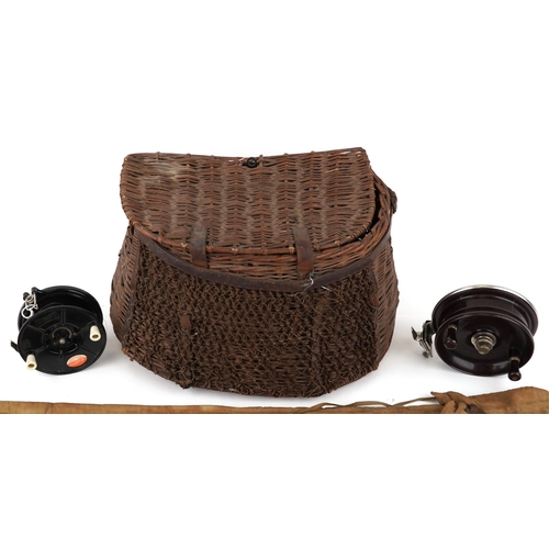 2317 - A vintage Hardy's wicker fishing creel basket, two fishing reels comprising Charles Alvey & Son Estu... 