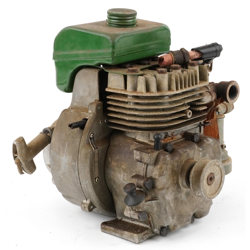 1128 - A vintage 50cc/75cc horizontal shaft four stroke engine.