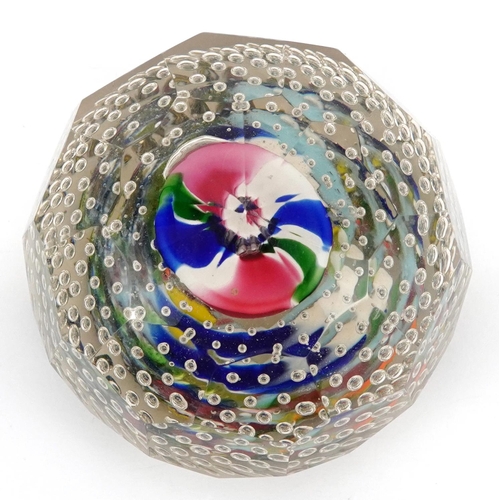 484 - An early 20th century, possibly German, glass paperweight with bubbled interior and coloured glass f... 