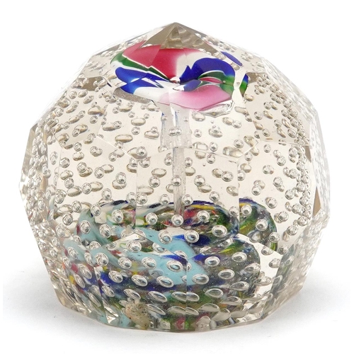 484 - An early 20th century, possibly German, glass paperweight with bubbled interior and coloured glass f... 