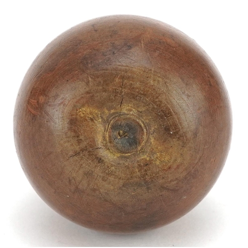 126 - An early 19th century turned fruitwood tea caddy, in the form of a pear, with screw off top applied ... 