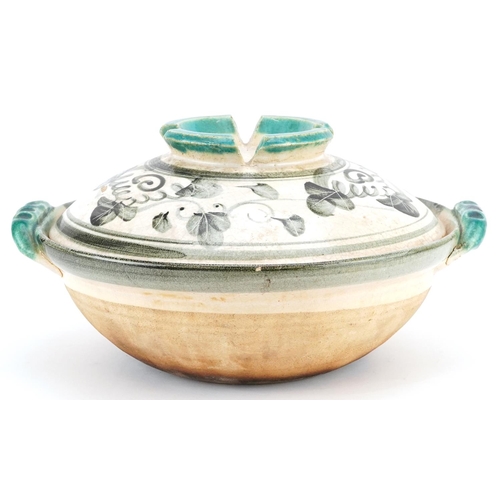 357 - A earthenware tagine, Turkey circa 1920, the cover with turquoise glazed indented corona, the bowl w... 