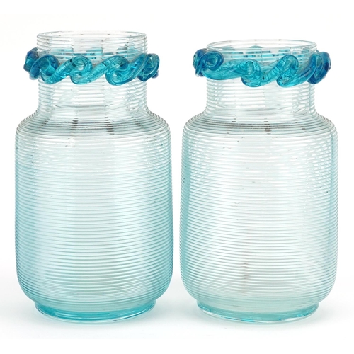 70 - A pair of Victorian pale blue glass beaker vases, circa 1880, each with a wave form frilly border, o... 